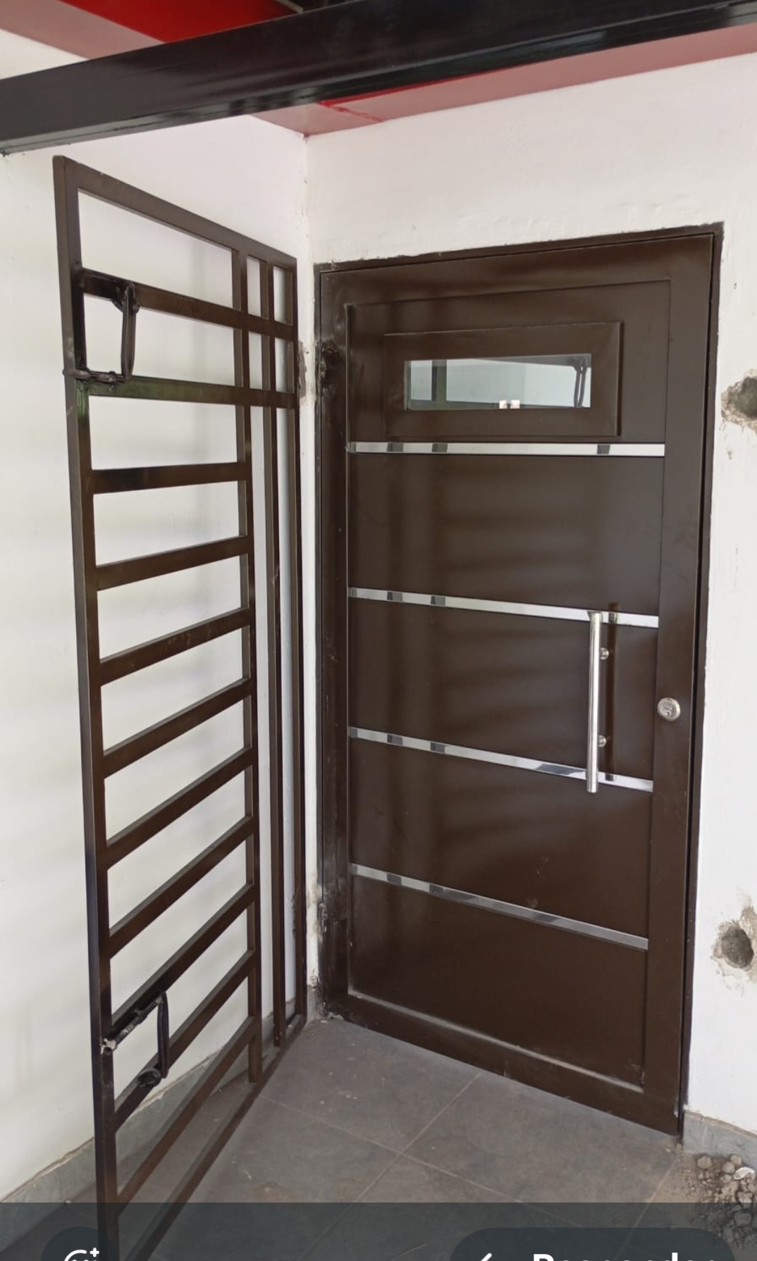 Puerta anoloc bronce con protector